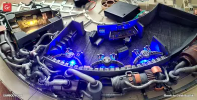 Detailed interior kit of the Millennium Falcon with lit control panels and intricate wiring details.
