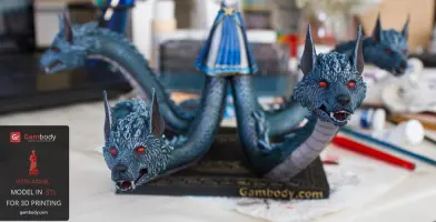 A 3D model of a hydra-like creature with multiple heads, displayed on a Gambody branded base.