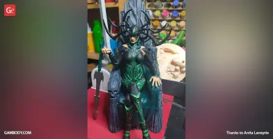 A figure in elaborate armor with antler-like headpiece sits on a dark throne, holding a tall spear.