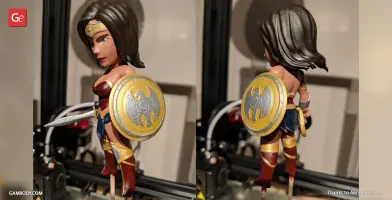 Chibi Wonder Woman figurine equipped with a shield and sword, featuring a cute and stylized design.