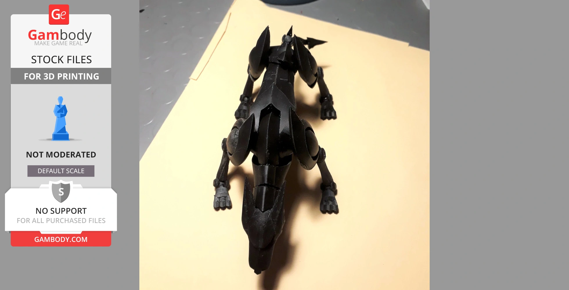 Black robotic panther-like model with articulated limbs, viewed from the top, on a beige surface.