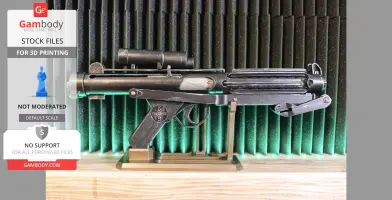 A 3D-printed model of a Stormtrooper E-11 blaster on display, against a textured background.