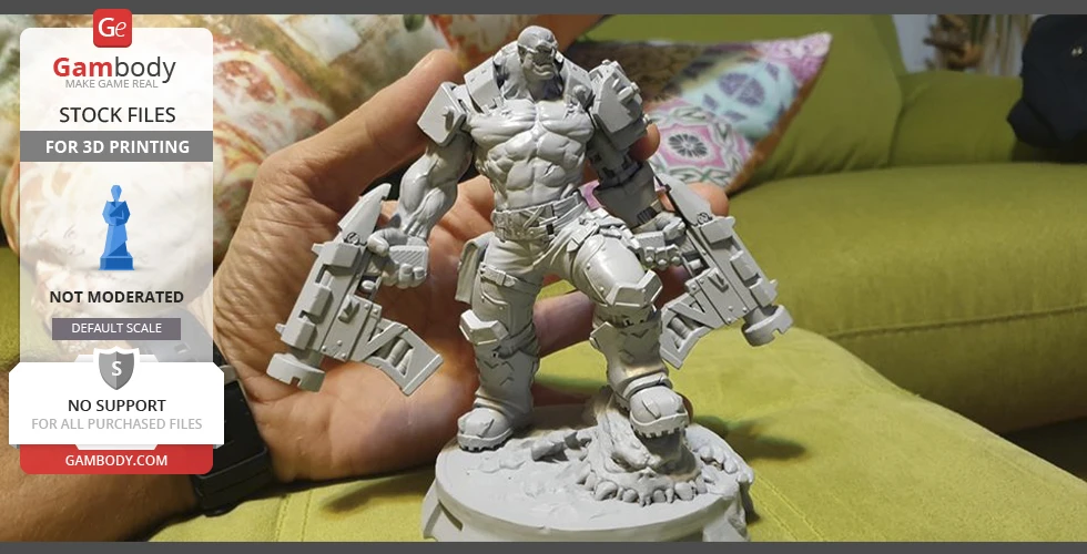 A detailed 3D printed model of an Orc Cyborg holding large weapons, standing on a decorative base.