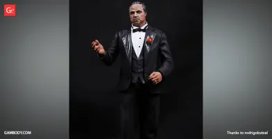 A 3D printed figure of a man in a tuxedo with a red rose, posed against a black background.