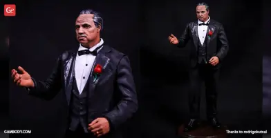 A detailed 3D print model of a suited man with a rose in his lapel, gesturing with one hand.