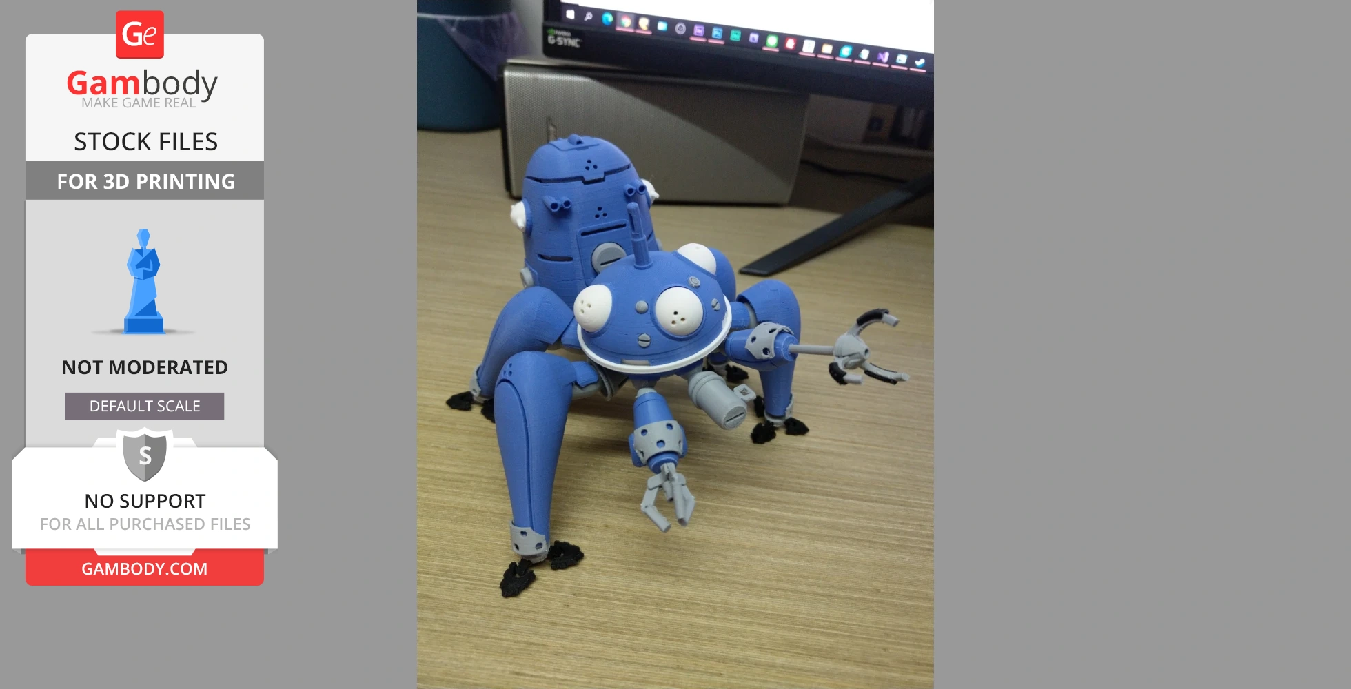 A blue 3D-printed robot with four legs and detailed features from 'Ghost in the Shell,' on a desk.