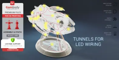 A 3D model of a spacecraft with LED wiring tunnels, presented on a display stand.