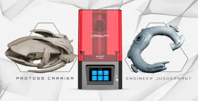 A Creality HALOT-ONE 3D printer with Protoss Carrier and Engineer Juggernaut models.