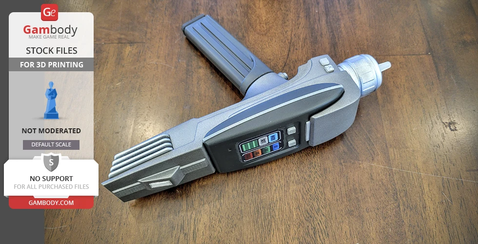 A 3D model of a Star Trek Phaser MK2, detailed and ready for 3D printing, displayed on a wooden surface.