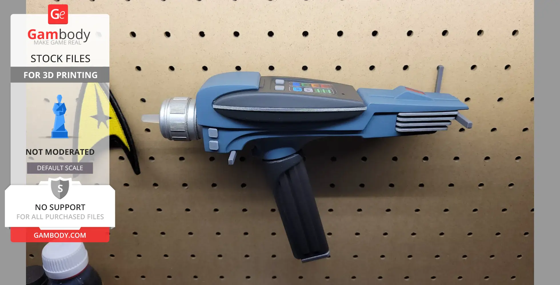 A blue and gray Star Trek Phaser MK2 model on a pegboard, showcasing details for 3D printing.