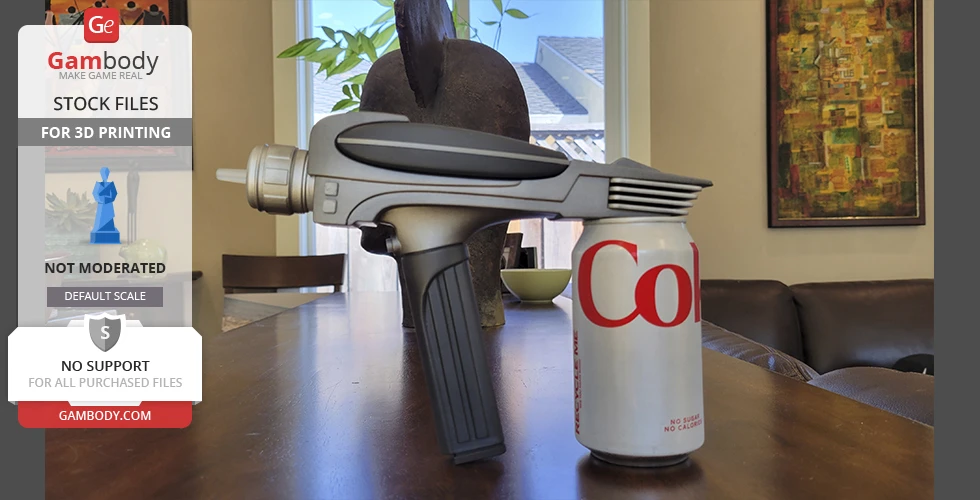 A 3D printed Star Trek Phaser MK2 model placed next to a soda can on a table.