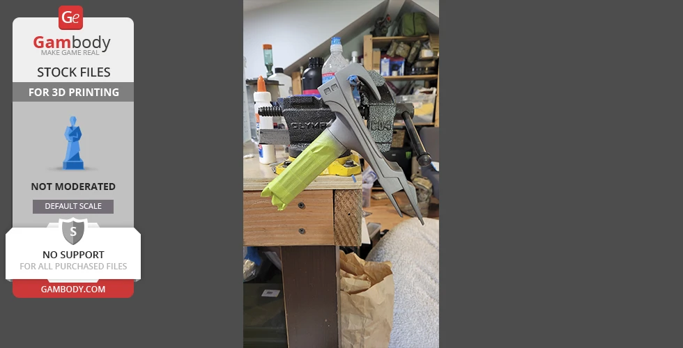 A Star Trek Phaser MK2 model clamped to a workbench, ready for painting or assembly.