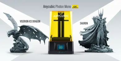 A 3D printer with Viserion dragon and Sauron models on either side.