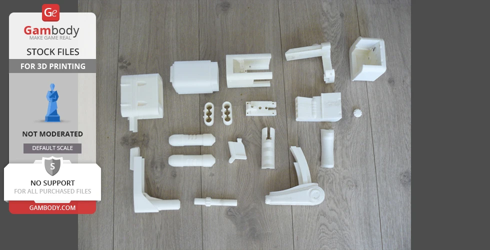 Array of white 3D-printed parts for assembling a Fallout Laser Pistol, laid out on a wooden surface.