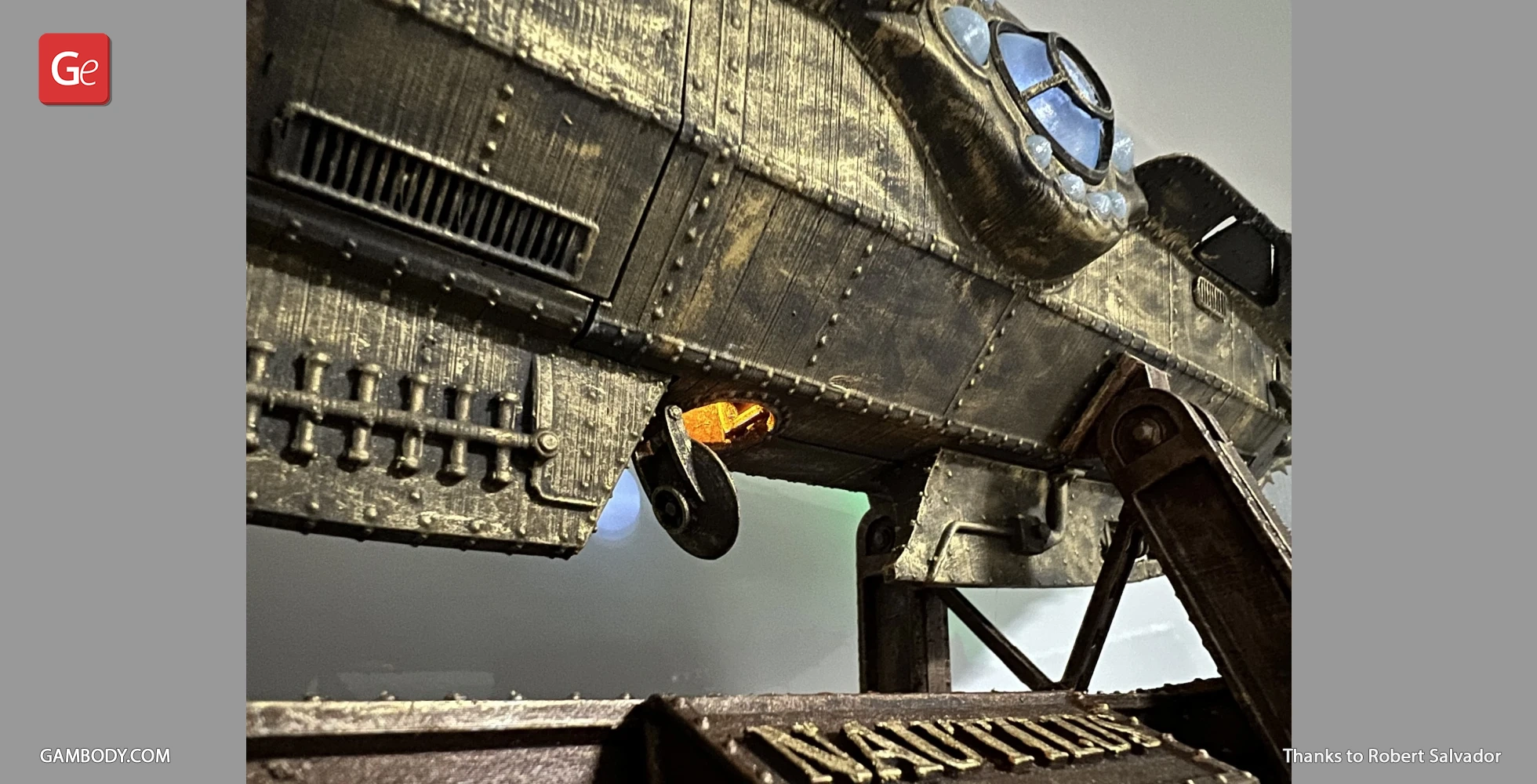 Close-up of a detailed Nautilus submarine model with a weathered, industrial design on a stand.