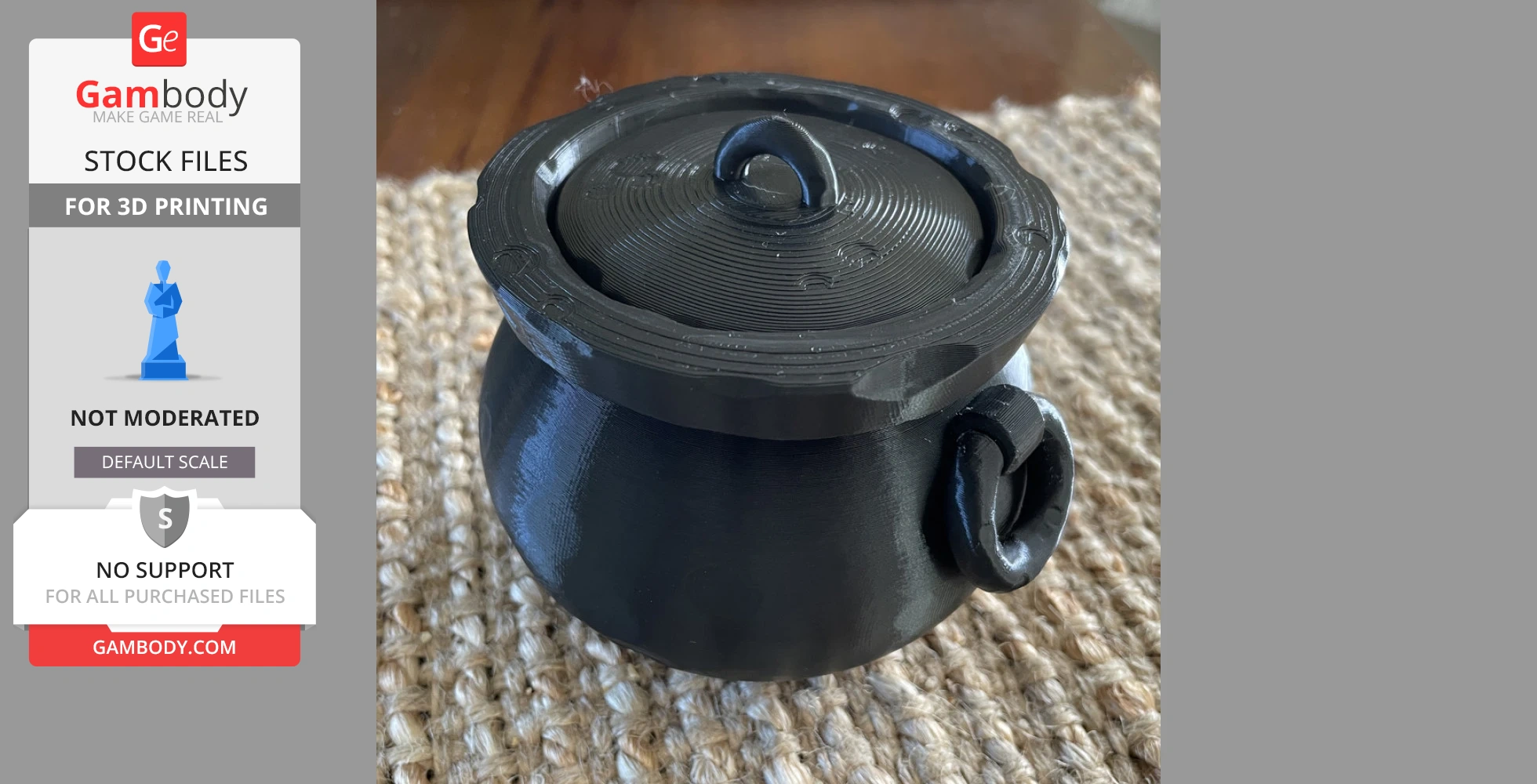 Black 3D-printed cauldron with lid and handle on a textured surface.