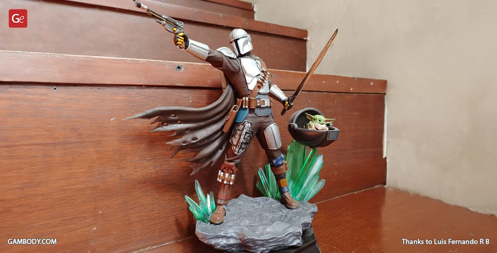 A 3D printed figure of an armored warrior holding weapons, with a small creature in a hovering pod nearby.