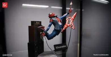 Spider-themed character in punk attire plays a red guitar, leaping beside an amplifier.