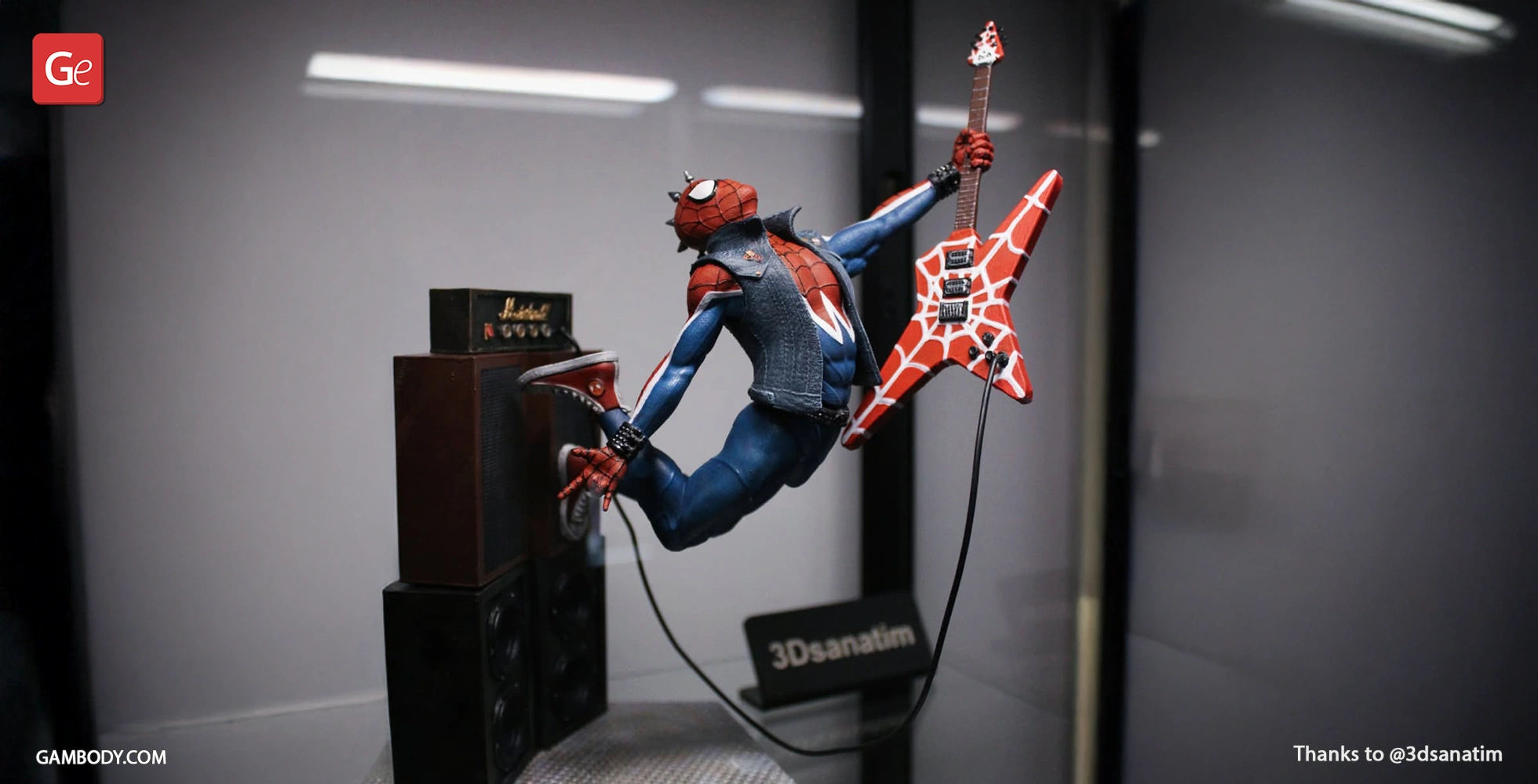 Spider-themed character in punk attire plays a red guitar, leaping beside an amplifier.