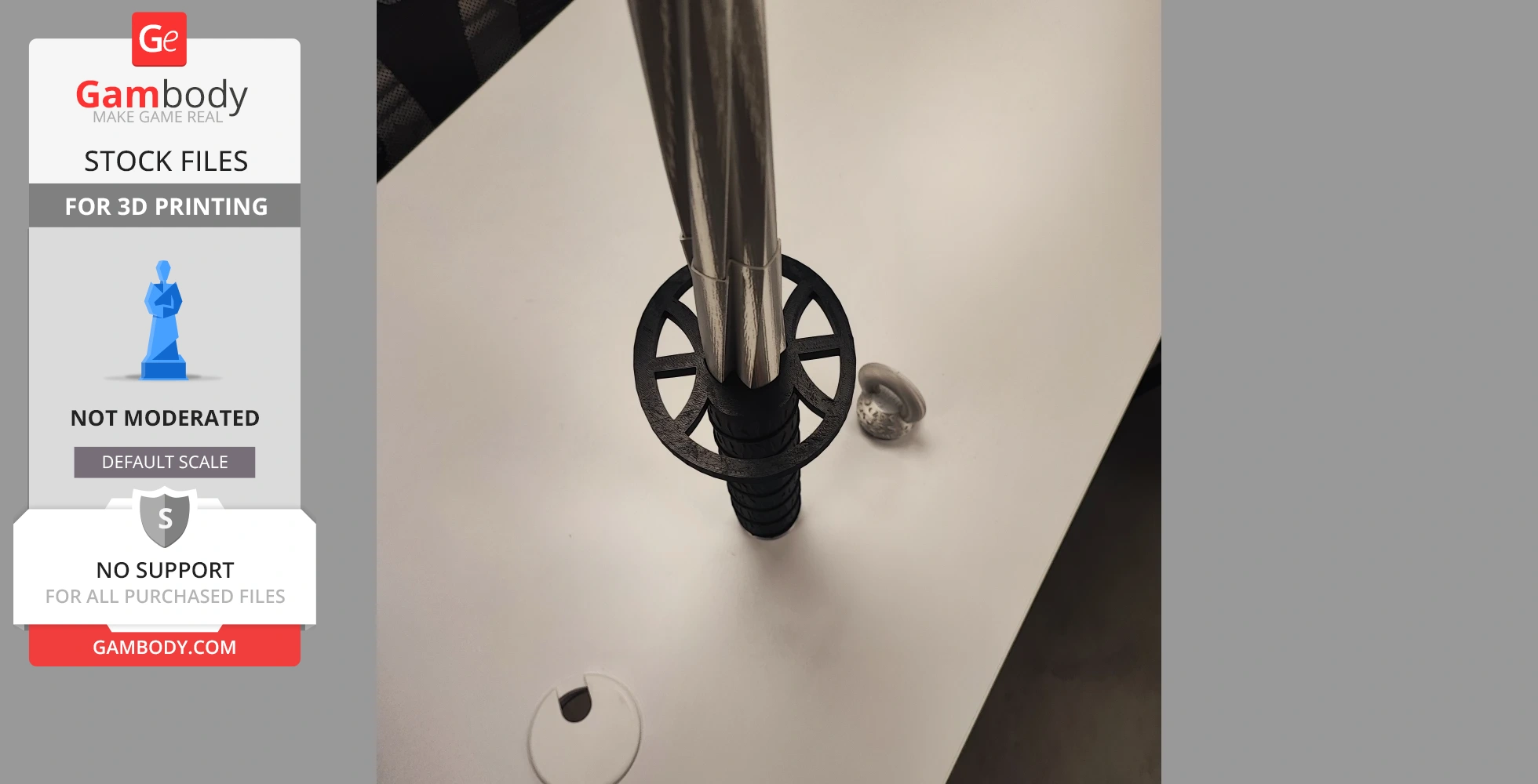 A silver sword with a black hilt and circular guard, resting vertically on a white surface.