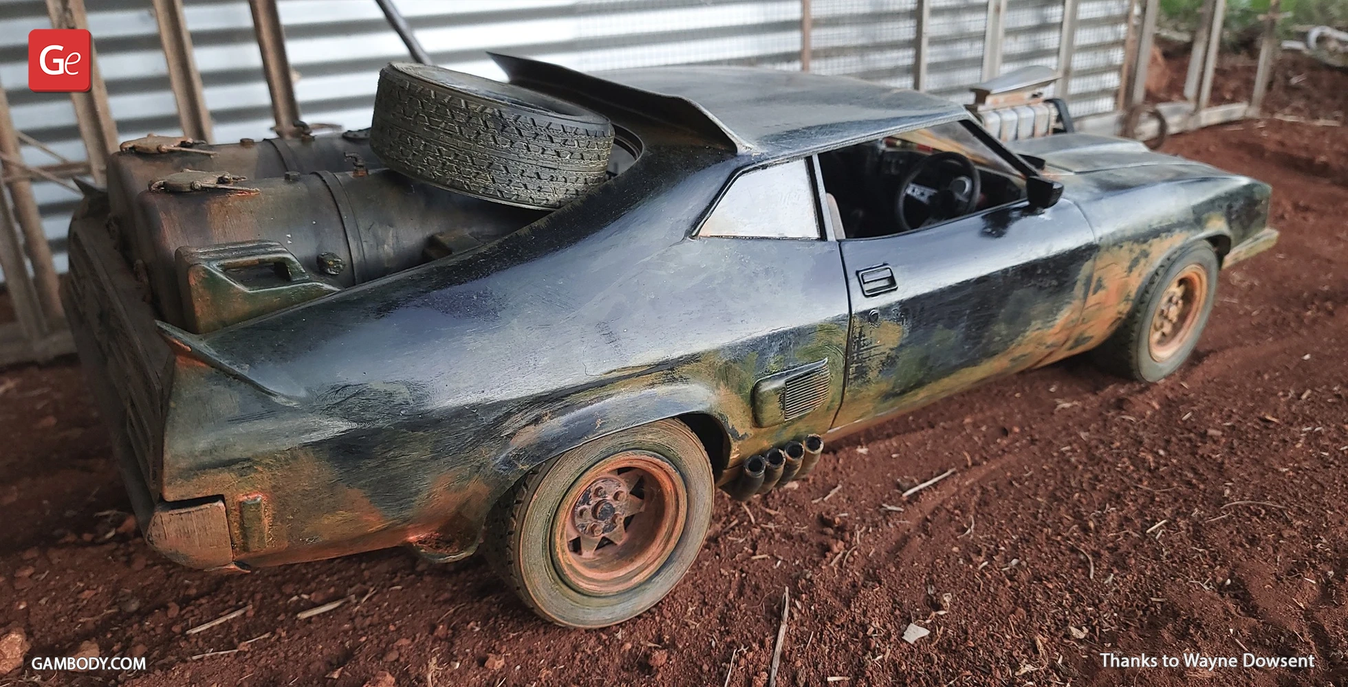 A detailed 3D printed model of a weathered Ford Falcon XB with rear modifications and spare tire on the trunk.