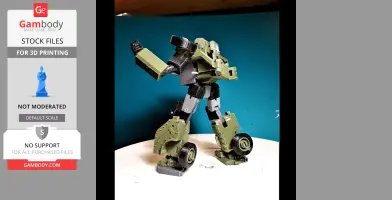A 3D-printed model of a green and black robot with wheels, posed as if in motion.