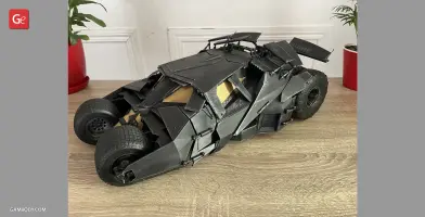 A detailed 3D-printed model of the Batmobile Tumbler from 'The Dark Knight,' in black color.