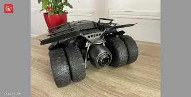 A detailed 3D printed model of the Tumbler vehicle from Dark Knight, with six large tires and jet engine.