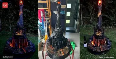 A detailed 3D-printed Barad-dur model with lava effects and the Eye of Sauron at the top.