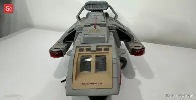 Gray Danube-Class Runabout 3D model with detailed features, viewed from the front on a display surface.