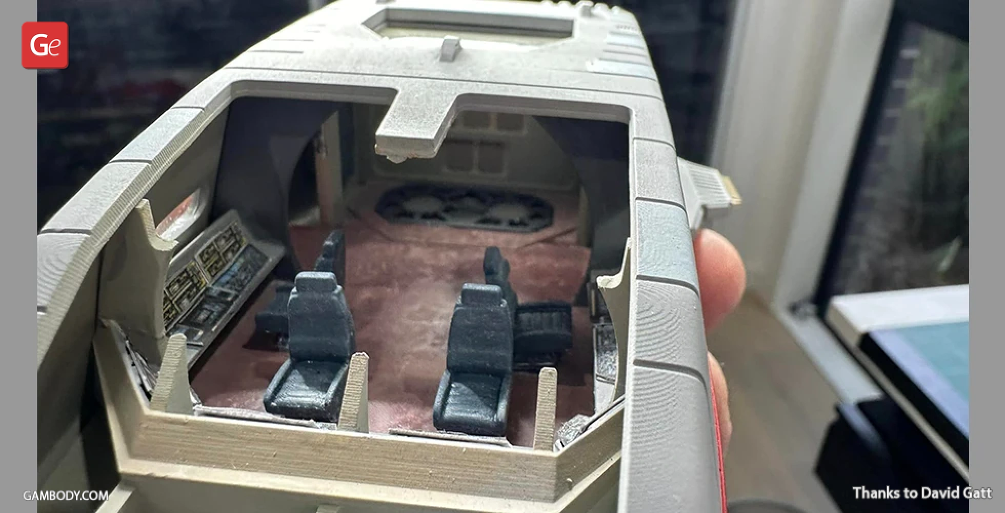 Interior view of a 3D-printed Danube-Class Runabout model with detailed cockpit and seating.