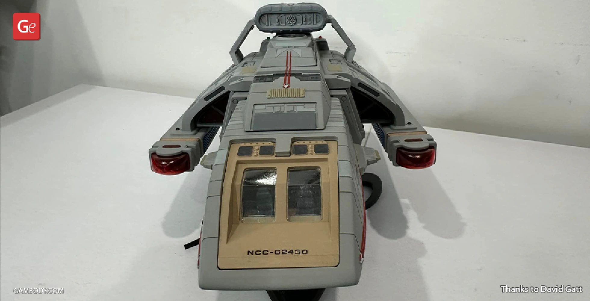 Gray Danube-Class Runabout 3D model with detailed features, viewed from the front on a display surface.