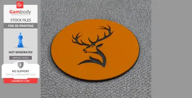 A circular orange mug rug with a cutout design of a deer's head with antlers.