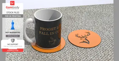 3D-printed mug and coaster on textured surface; mug reads 'FROGET LOVE, FALL IN COFFEE,' coaster has a deer design.