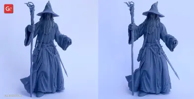 A 3D model of a wizard with a long beard, staff, and pointed hat, wearing a cloak.
