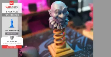 A smiling jester head on a spring, resembling a Jack-in-the-box, ready for 3D printing.