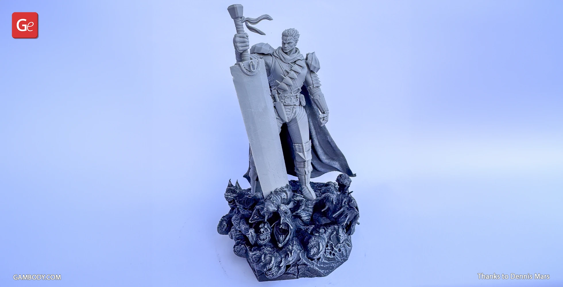 A 3D-printed model of a warrior with a large sword, standing on a base of skulls and creatures.