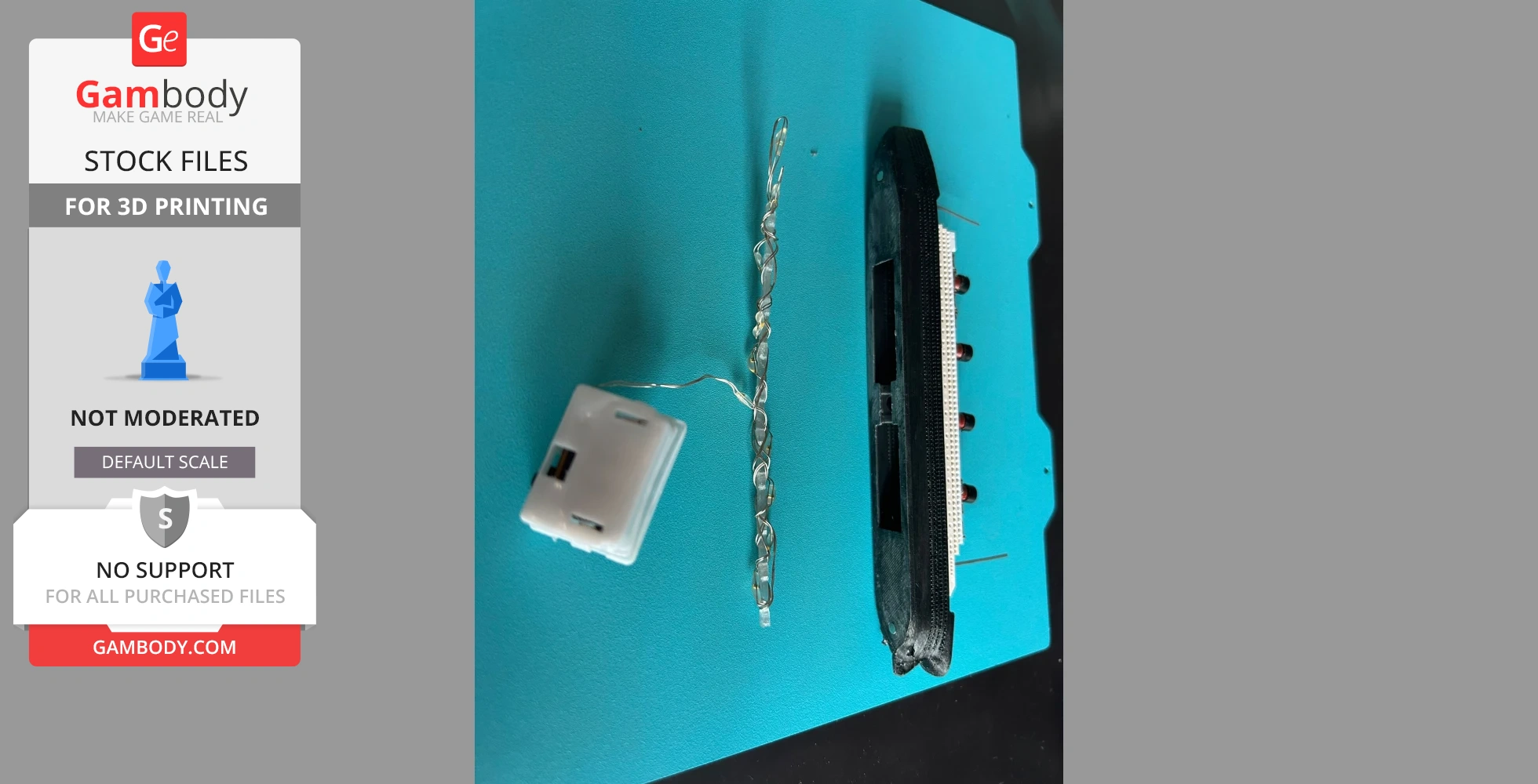 3D printed Titanic ship model with LED lights on a turquoise background.