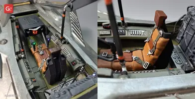 Detailed Star Wars cockpit with brown seat, control panels, and illuminated buttons.