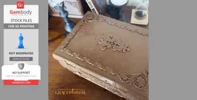 Elegantly carved, ornate brown case with floral designs on a wooden table, for tabletop games.