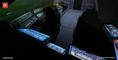 Interior view of the Enterprise D Shuttlecraft Type 6, featuring illuminated control panels and seats.