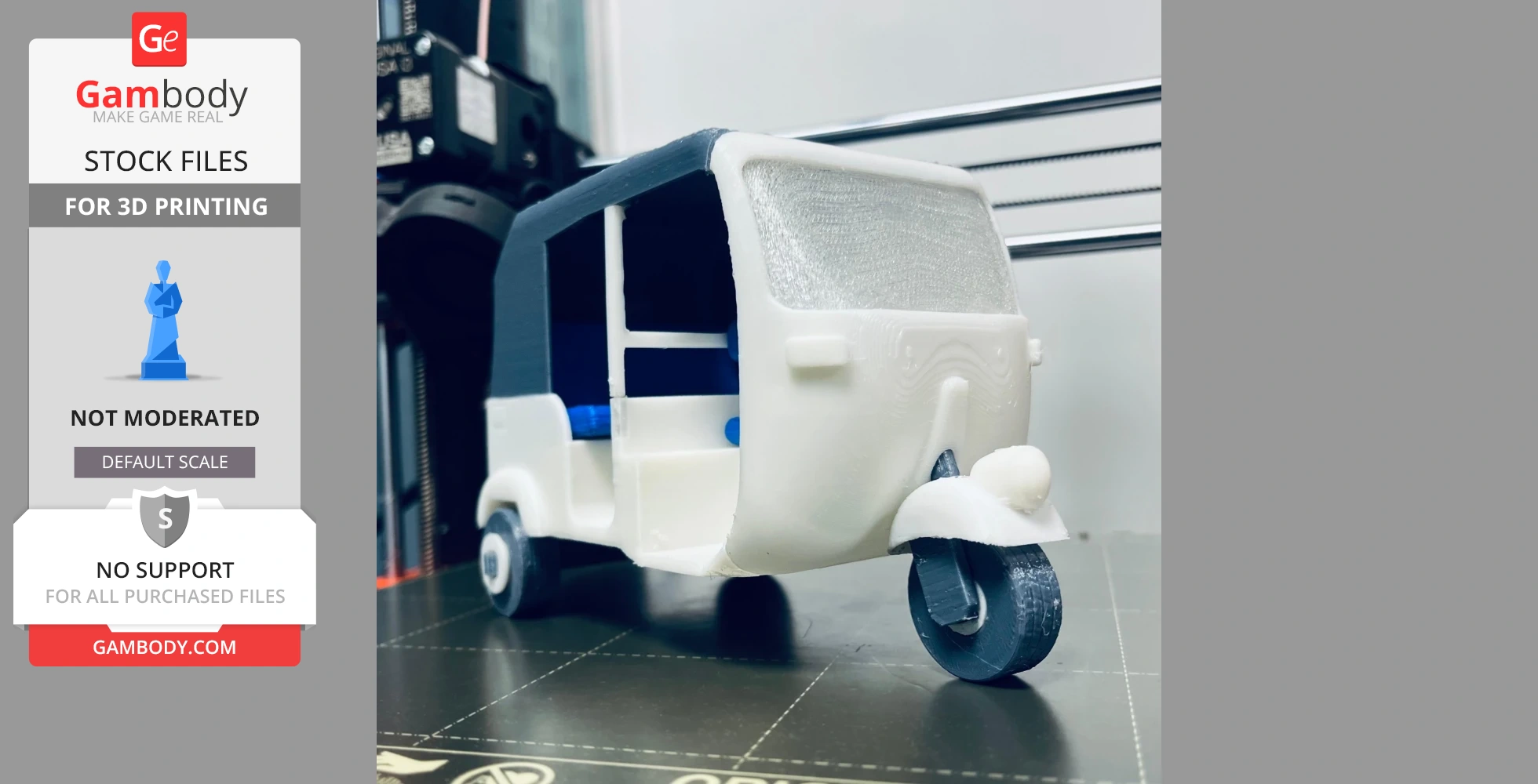 3D printed model of a three-wheel tuk-tuk with functional steering on a printer bed.