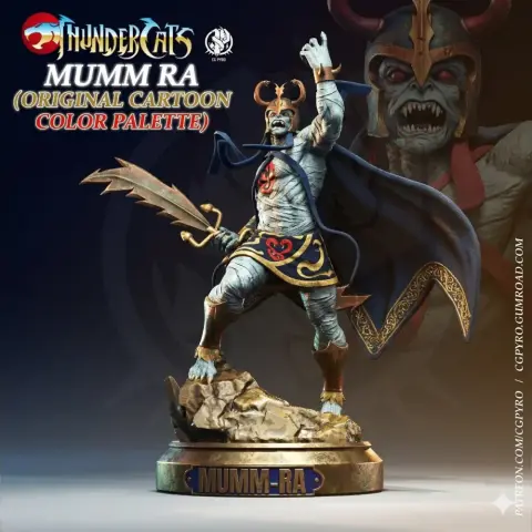 Mumm-Ra figurine in red and black, with a cape and sword, on a rocky base, from Thundercats.