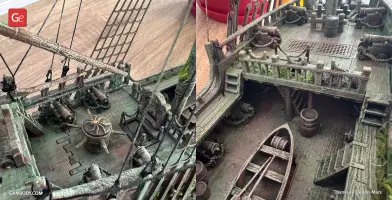 Detailed model of the Flying Dutchman ship, featuring deck details, cannons, and weathered textures.