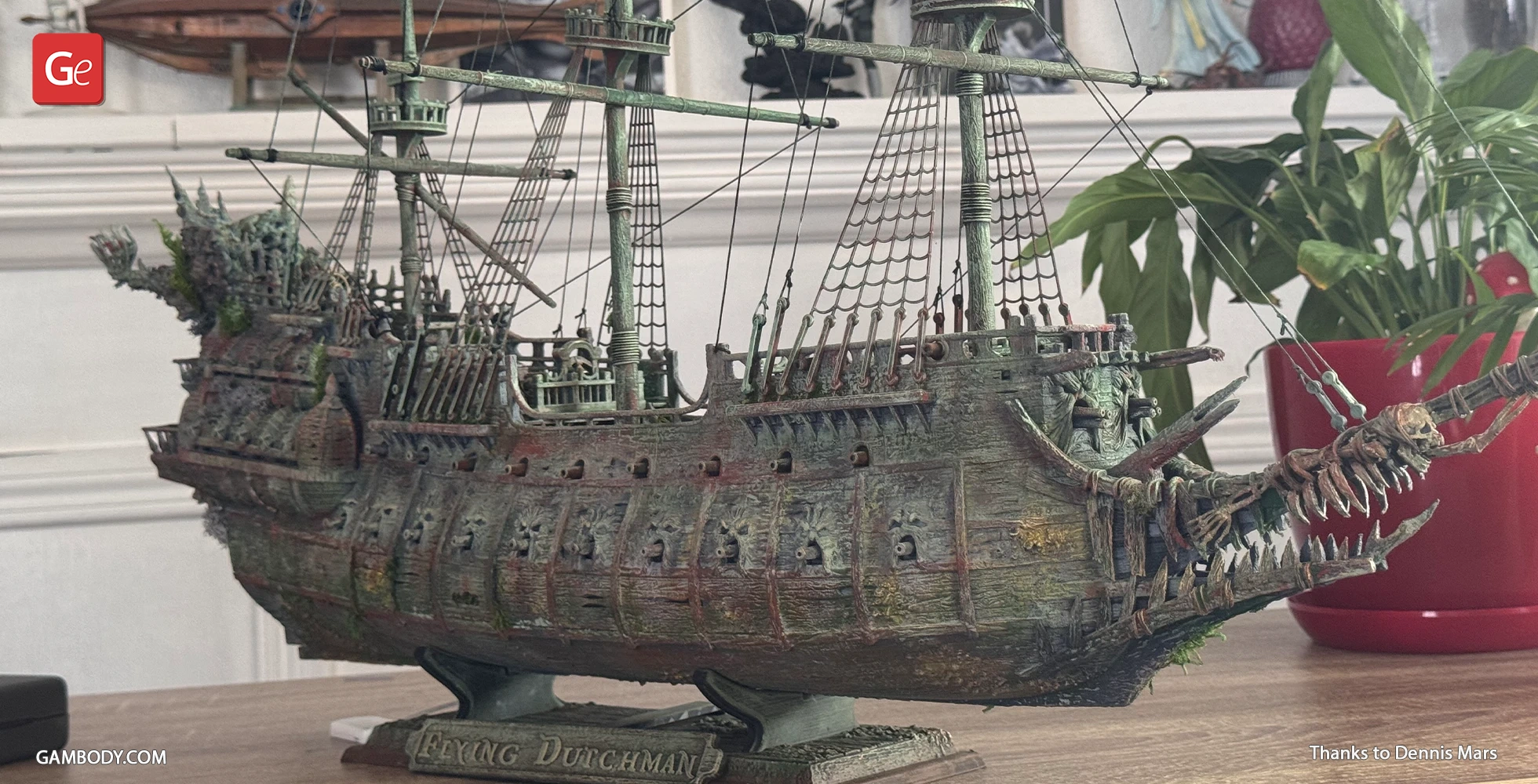 Detailed model of the Flying Dutchman ship with eerie, skeletal features on a tabletop display.