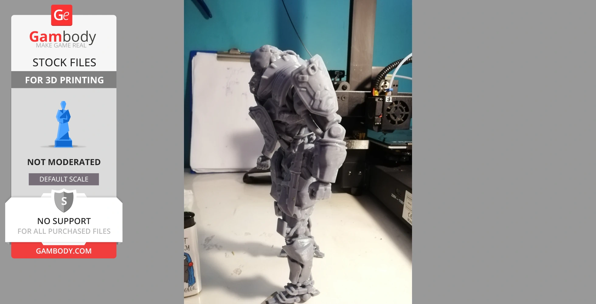 A detailed 3D-printed figure of a futuristic armored character in a stationary pose on a desk.