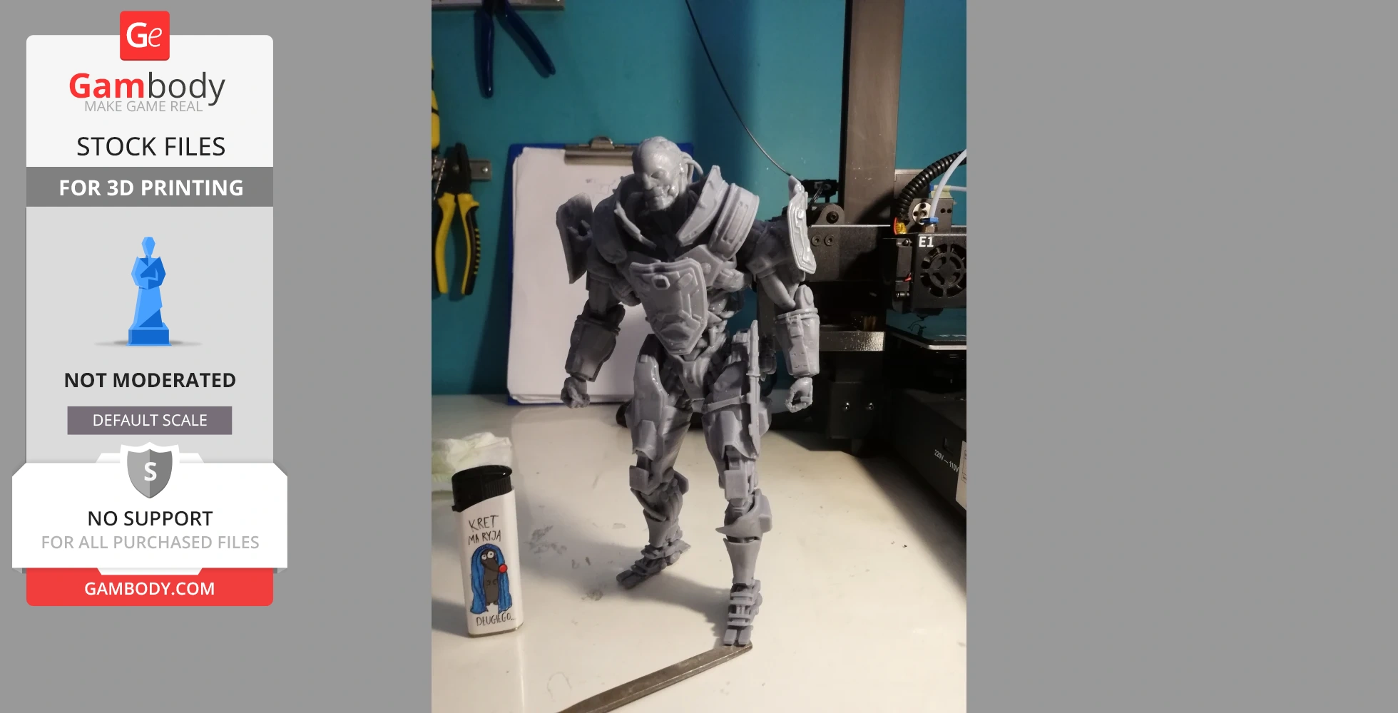 A detailed, gray 3D-printed armored figure stands on a desk near a 3D printer and tools.