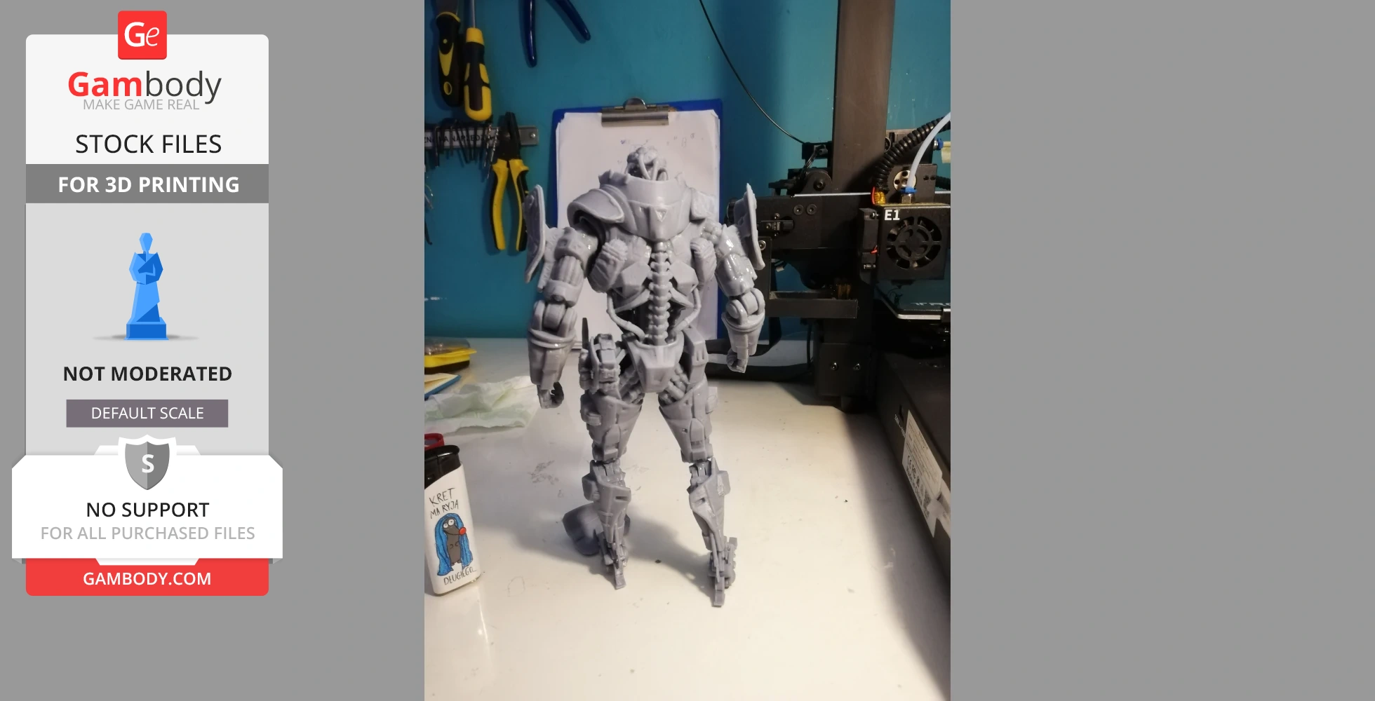 A detailed gray 3D-printed armored character model standing on a workbench.