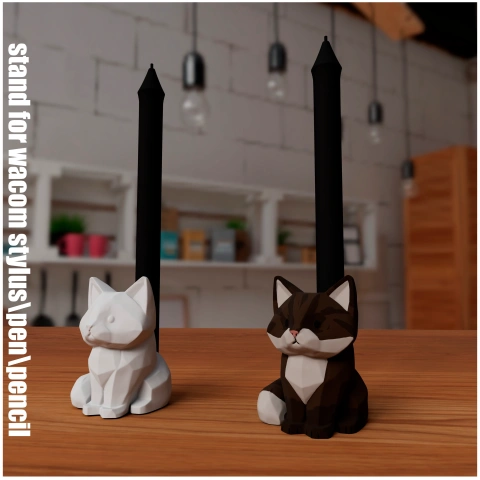 Two cat-shaped pen holders in white and brown sit on a wooden surface.