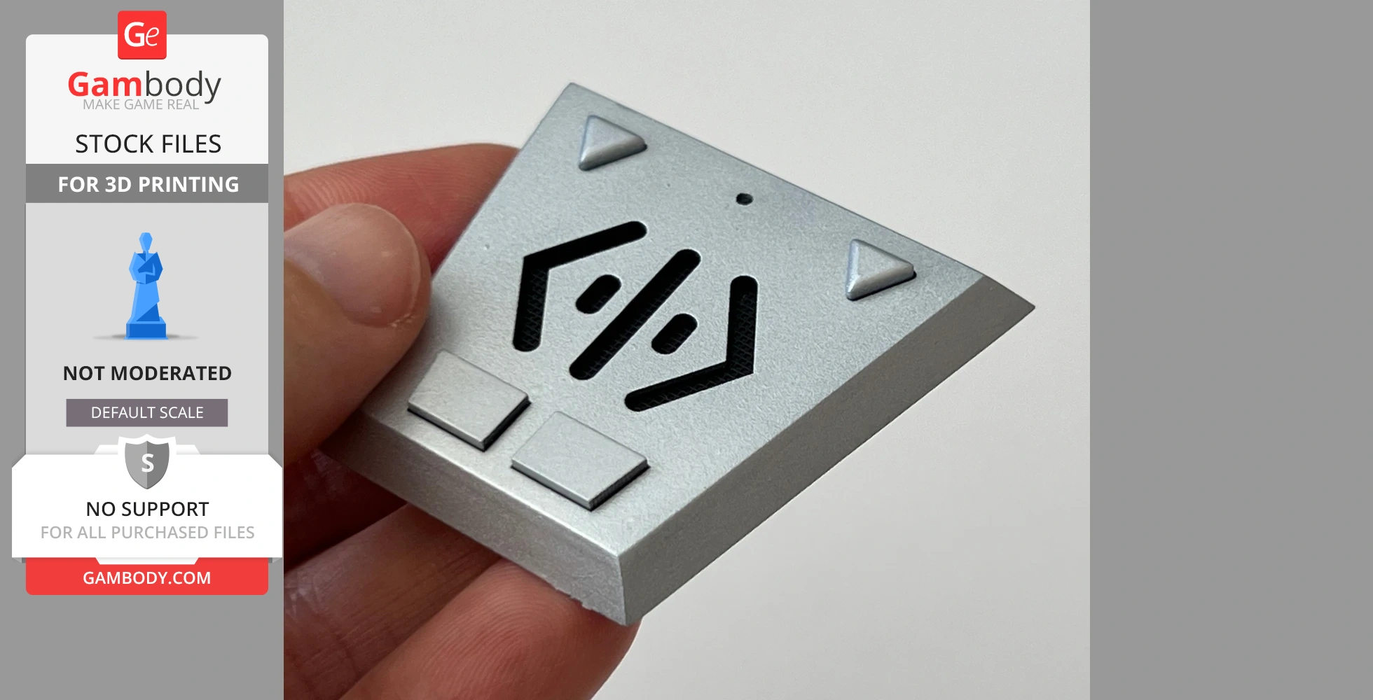 A person holding a silver, triangular Babylon 5 comm-link prop with buttons and patterns.